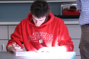 Zach Mellon signs his Letter of Intent for Wisconsin.