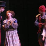 Valjean argues with the scamming Thenardiers for the care of Cosette.