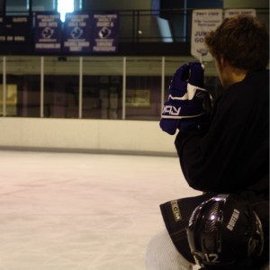 Senior Cole Meyer takes a break from skating.  Photo by Lauren Rosso