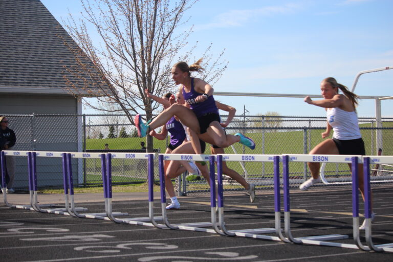 Rose Lamberts competes in the hurdles at the home track meet on April 28.