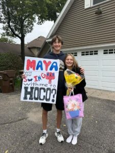 Ben Asleson asks Maya Parsons to homecoming with a Spider-Man sign