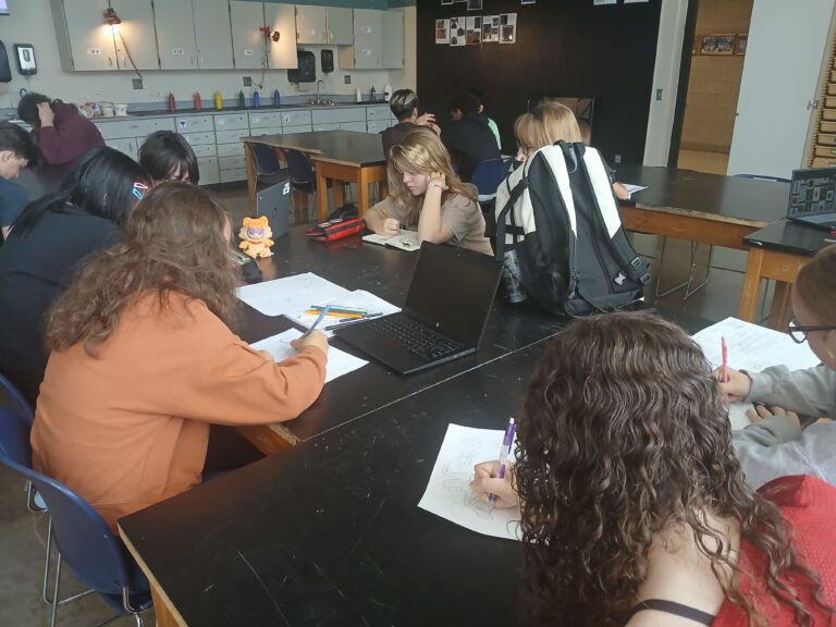 Ms. Post's students work on their latest project