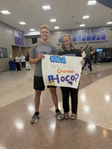 Jarem Tew asks Karina Wuollet to homecoming with a 'cheesy' sign