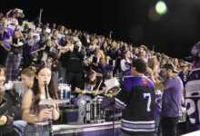 Members of the pep band perform during the Homecoming Game.