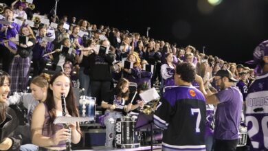 Members of the pep band perform during the Homecoming Game.