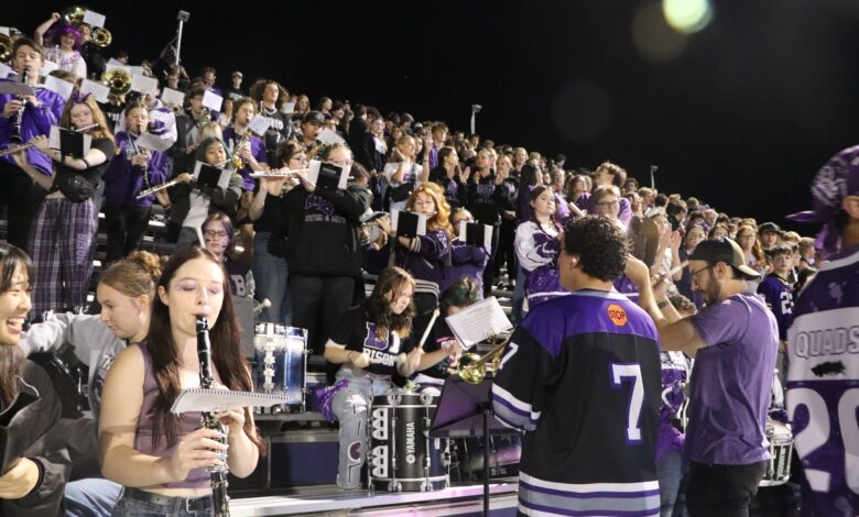 Members of the pep band perform during the Homecoming Game.