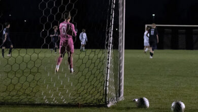 Bison Goalie gives valiant efforts to protect the net.