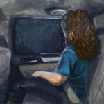 A girl wearing headphones looks out a car window form the back seat during a nighttime drive.