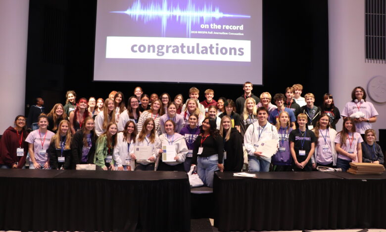 The Hoofprint staff are taking a group photo at a Journalism Convention.
