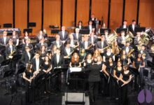 Buffalo High School band students perform on stage during their fall concert