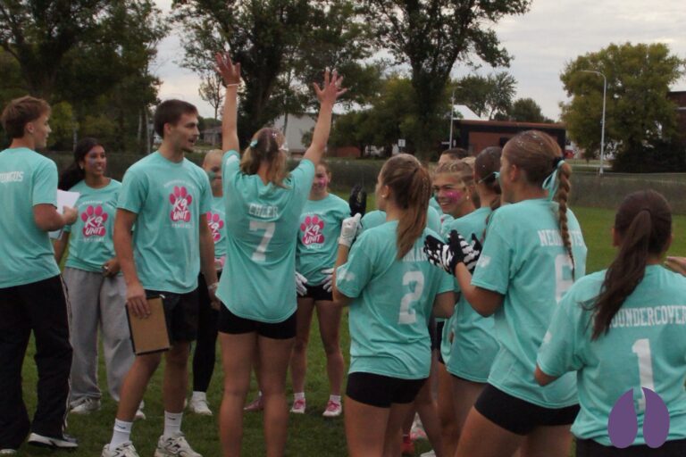 Members of the K-9 Unit celebrate their Powderpuff Game win.