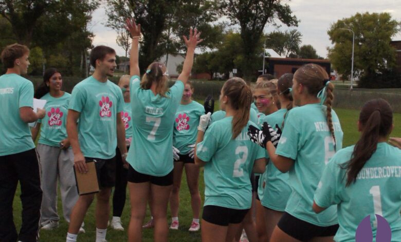 Members of the K-9 Unit celebrate their Powderpuff Game win.