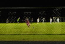 Bison goalie Gerhard Ungaro 27' passes soccer ball to teammates while taking a goal kick