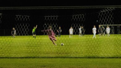 Bison goalie Gerhard Ungaro 27' passes soccer ball to teammates while taking a goal kick